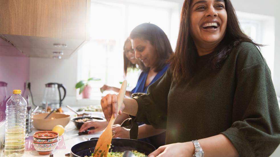 Happy women cooking